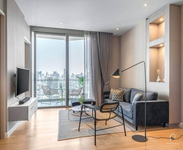 bedroom and living room of Magnolias Waterfront Residences