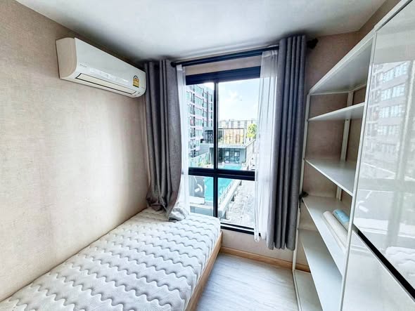 bedroom of Maxxi Condo