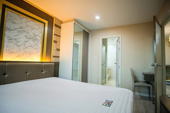 bedroom of Metro Luxe Rama 4