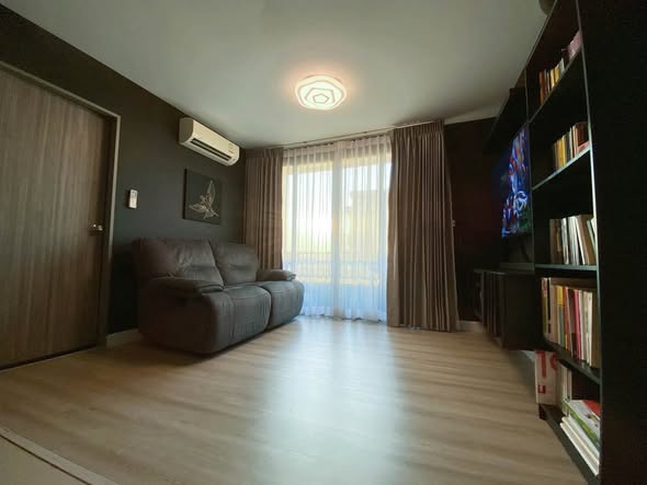 living room and bedroom of Metro Luxe Ratchada