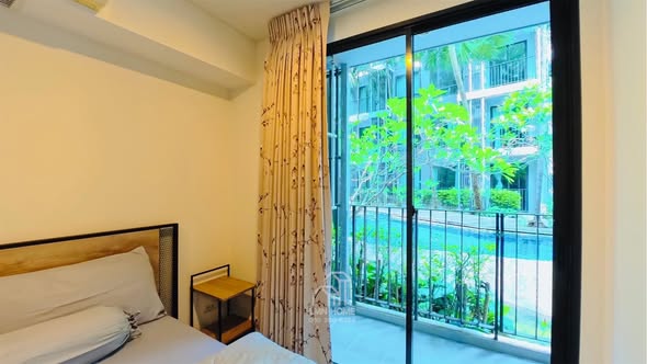 bedroom of Metro Luxe Riverfront Rattanathibet