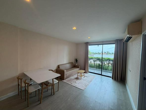 bedroom of Metro Luxe Riverfront Rattanathibet