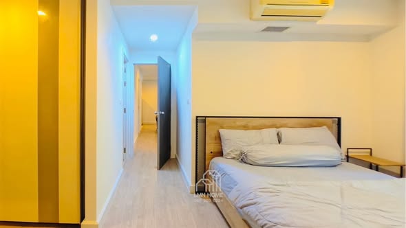 bedroom of Metro Luxe Riverfront Rattanathibet