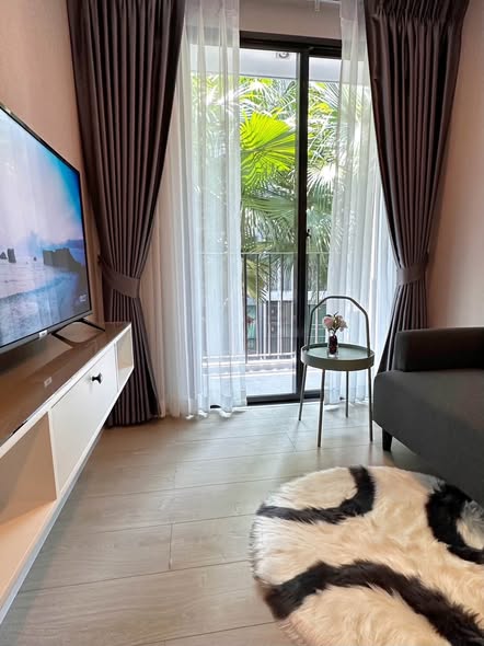 bedroom and living room of Metro Luxe Riverfront Rattanathibet