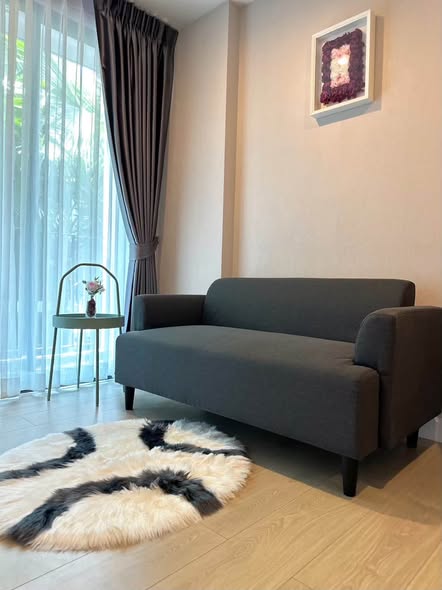 bedroom and living room of Metro Luxe Riverfront Rattanathibet
