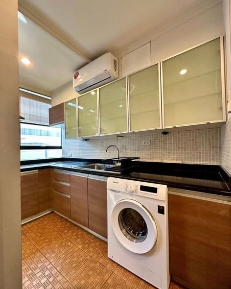 New House Condominium