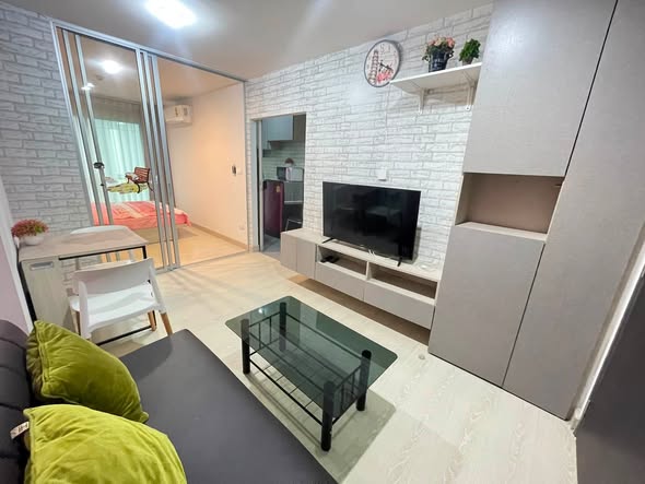 bedroom and living room of คอนโด Niche id