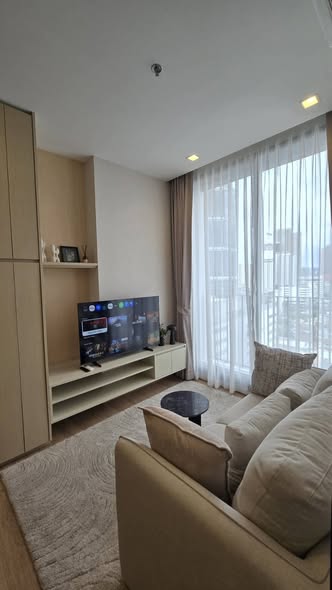 bedroom and living room of Noble Around Ari