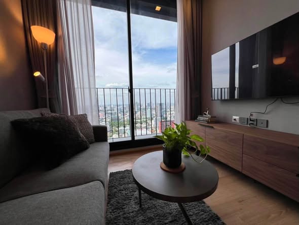 bedroom and living room of Noble Around Ari