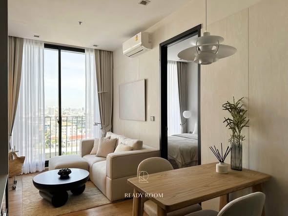 bedroom and living room of Noble Around Ari