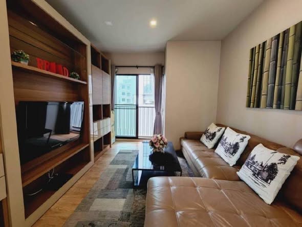 bedroom and living room of Noble Refine