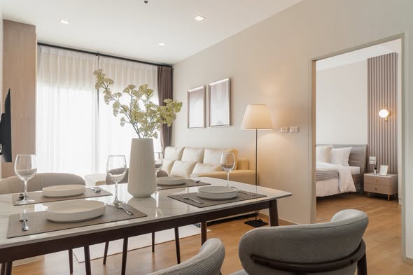 bedroom and living room of Noble Reveal