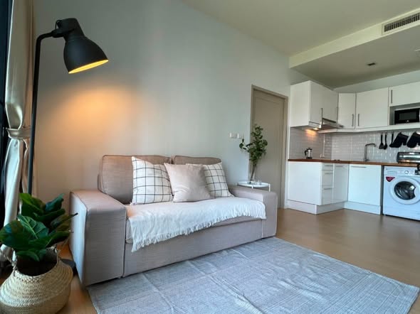 living room and bedroom of Noble Reveal