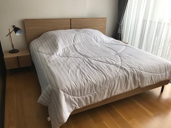 bedroom of Noble Revo Silom