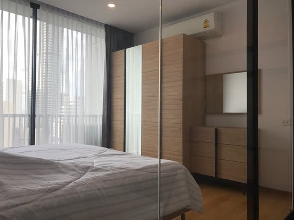 bedroom and room interior of Noble Revo Silom