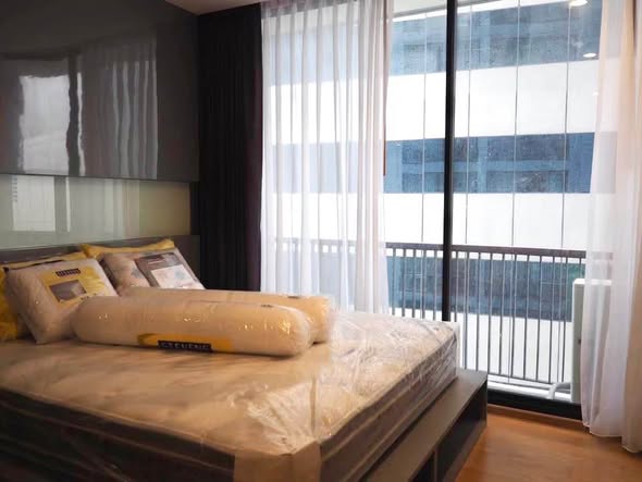 bedroom and room interior of Noble Revo Silom
