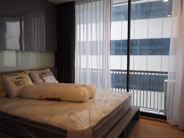 bedroom and room interior of Noble Revo Silom