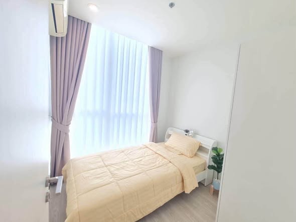 bedroom of Noble Revolve Ratchada 1