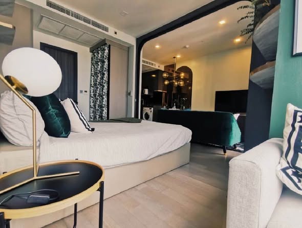 living room and bedroom of Noble Revolve Ratchada 1