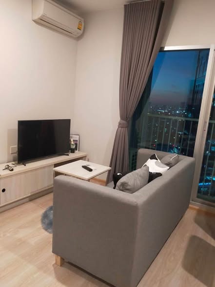 living room and bedroom of Noble Revolve Ratchada 1