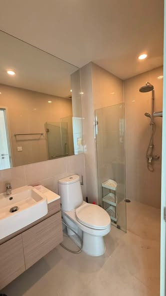 room interior and bathroom of Noble Revolve Ratchada 1