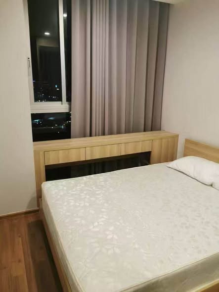 bedroom of Noble Revolve Ratchada 2