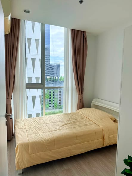 bedroom of Noble Revolve Ratchada 2