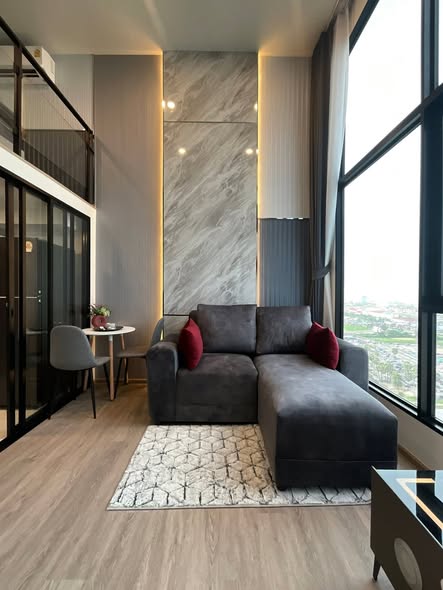 living room of Origin Plug & Play Nonthaburi Station