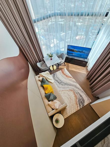 living room and bedroom of Park Origin Chula-Sam Yan