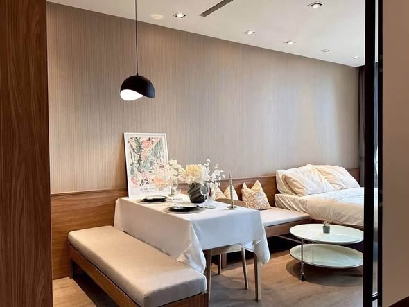 living room and bathroom of Park Origin Phrom Phong