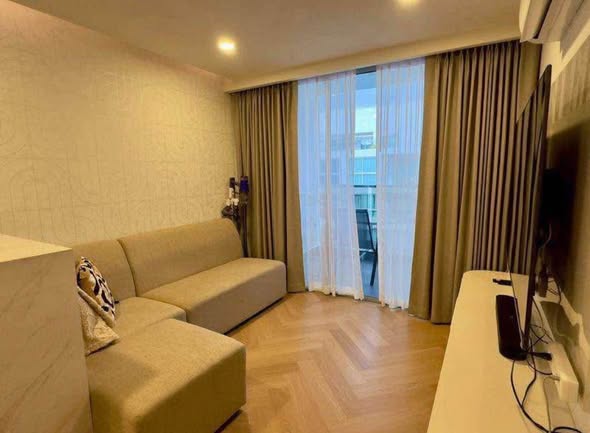 bedroom and living room of PARKROYAL Suites Bangkok