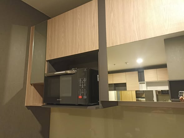 bathroom and kitchen of Plus Condo Korat