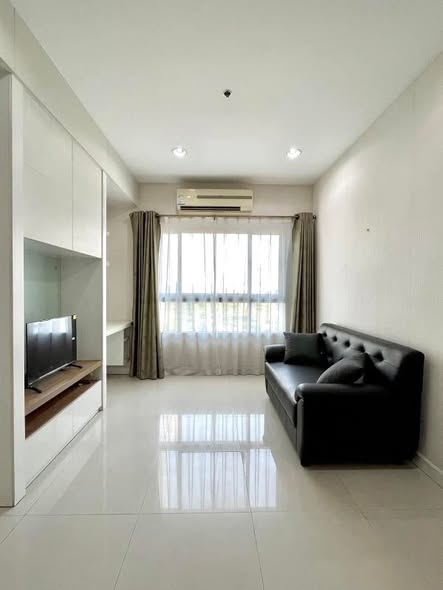 bedroom and living room of Q.House Sathron