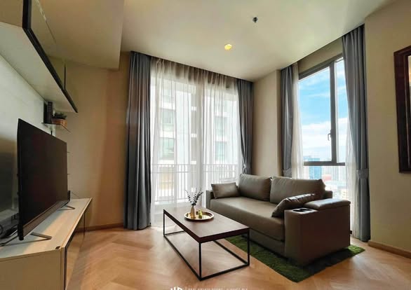 bedroom and living room of Quattro by Sansiri