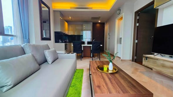 bedroom and living room of Quattro by Sansiri