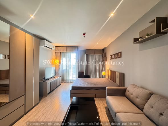 bedroom and living room of RHYTHM Ekkamai
