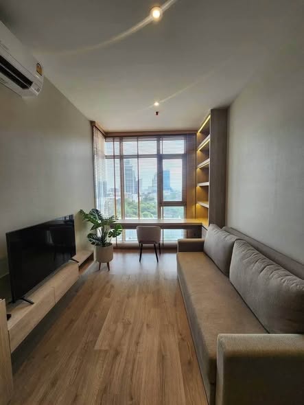 bedroom and living room of Rhythm Ekkamai Estate