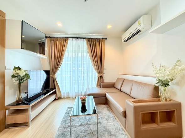 bedroom and living room of RHYTHM Ratchada-Huaykwang
