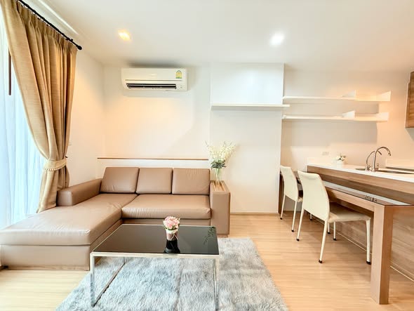 bedroom and living room of RHYTHM Ratchada-Huaykwang