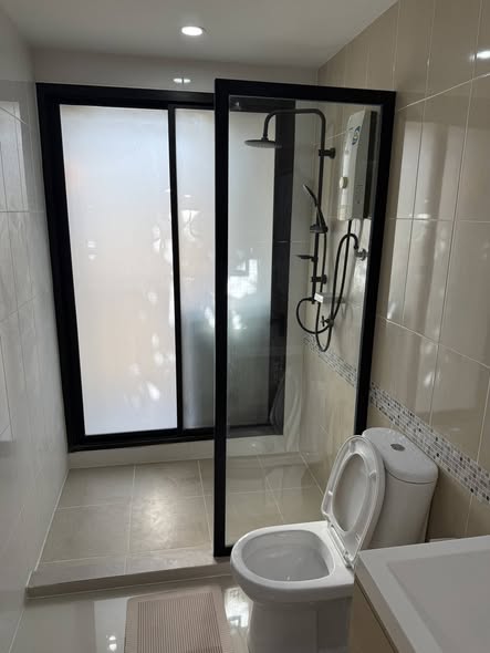 room interior and bathroom of S1 Rama 9 Condominium