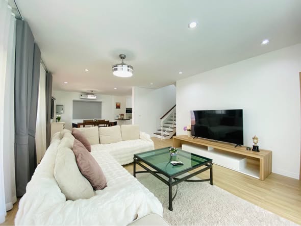 bedroom and living room of Seaside Symphony Luxury Party Pool Villa Pattaya (Private Pool and Exclusive Beach Access)