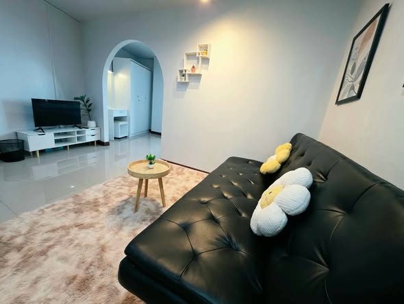 living room and bedroom of Serrano Condominium
