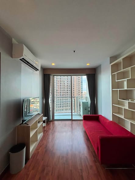 living room and bedroom of Sky Walk Residences