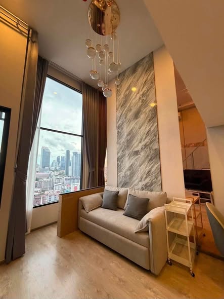 living room and bedroom of SOHO​ BANGKOK​ RATCHADA​