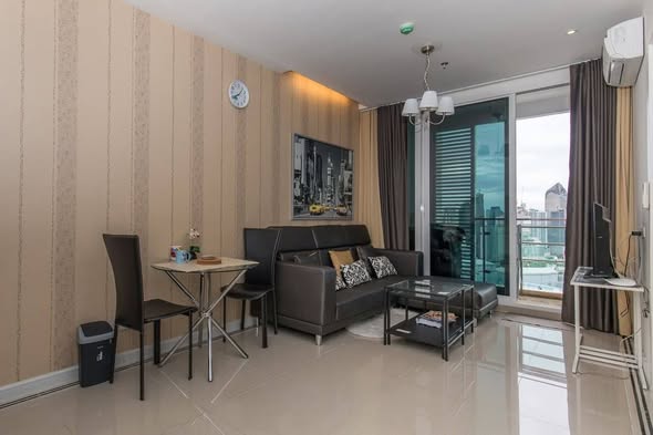 bedroom and living room of TC-Green Condominium