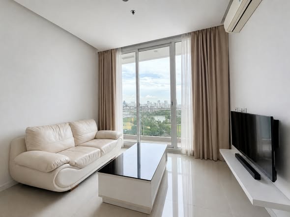 living room and bedroom of TC-Green Condominium