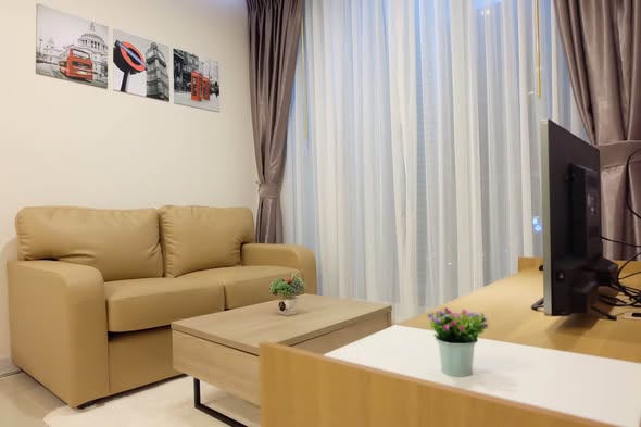 living room and bedroom of TC-Green Condominium