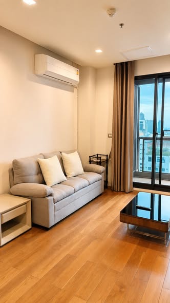 living room and bedroom of The Address Sathorn