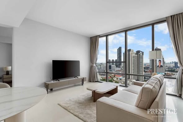 bedroom and living room of The Bangkok Sathorn