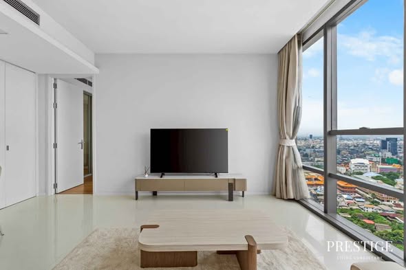 living room and bedroom of The Bangkok Sathorn